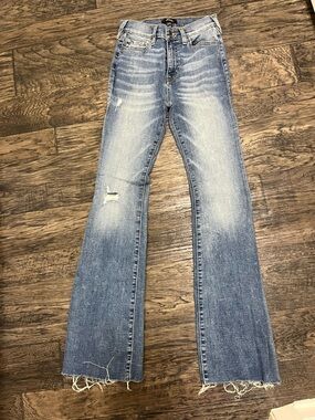 True Religion Light Wash Flare Jeans with Raw Hem